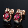 Pendientes coreanos entrelazados con forma de corazón de rubí, muy populares, con turmalina roja natural y chapados en oro rosa de 18 quilates y diamantes.