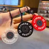 Llavero Colgante Mini Mancuerna de Fitness Creativo Llavero para Coche Bolsos Colgante Pequeño Deportivo Venta al por Mayor