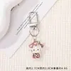 Llavero de Gato KT Estampado de Leopardo Colgante de Dibujos Animados de Resina y Aleación Encanto Lindo para Bolsos Llavero de Gatito Estampado de Leopardo Venta al por Mayor