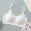 Sujetador infantil sin costuras con almohadillas adhesivas, diseñado para la etapa de desarrollo, presenta copas fijas que se mantienen en su lugar, camiseta cómoda