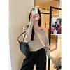 Suéter tejido negro de un hombro descubierto para mujer, adecuado para primavera, otoño e invierno, de corte holgado, manga larga, con un estilo casual y relajado