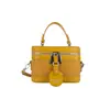 Bolso pequeño de lujo ligero transfronterizo para mujer 2026 nuevo modelo bolso de mano tipo caja bolso cuadrado pequeño retro versátil de moda para un solo hombro o cruzado
