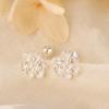 Pendientes chapados en plata S925 para mujer, elegantes pendientes de loto con forma de hueso de oreja, estilo vintage, 2024.