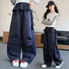 Calça de Trabalho Infantil Feminina Outono 2026 Novo Estilo Primavera e Outono para Crianças Grandes e Médias Moda Calça Comprida Cobre Bumbum Lâmina Curva Roupa Externa