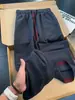 Calça de seda gelada leve azul marinho com multi-padrão para outono para homens, calça comprida respirável com design color-blocking, calça esportiva cleanfit