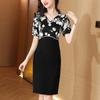 Vestido Negro Estilo Francés Ligeramente Maduro para Mujer Verano 2025 Nuevo Cintura Alta Elegante Estampado Falso Dos Piezas Falda de Cadera