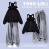 Conjunto casual versátil estilo preppy de chaqueta con cremallera y orejas de conejo de encaje patchwork estilo coreano para niñas y jeans 2026