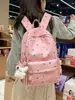 Mochila casual colorida com estampa de estrelas na cor creme para meninas, bolsa escolar fofa para alunos do ensino fundamental e médio para a escola e viagens de férias