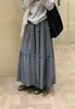 Foto real: Nova saia feminina estilo floral suave para o início do outono, nova saia longa floral 2026, saia evasê casual fresh