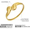 Pulsera versátil y moderna de acero inoxidable chapado en oro de 18 quilates con cadena cubana lisa en forma de corazón, abierta, para mujer, adecuada para el uso diario.