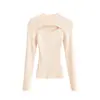 Top de punto retro sexy con huecos, cuello semi-alto, corte ajustado, primavera 2026, diseño único, top elegante y a la moda