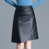 Saia de couro irregular em linha A, saia midi justa ao corpo para mulheres, nova saia lápis casual de cintura alta emagrecedora para outono e inverno de 2026