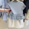 Nuevo conjunto de verano para niñas 2025 Camiseta con volantes de manga corta Pantalones de pierna ancha de color liso Conjunto de dos piezas Traje de verano