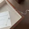 Colar com Pingente de Borla de Pérola de Água Doce Redonda em Prata Esterlina S925 Design de Luxo Acessível de Nicho Feminino Corrente Assimétrica Corrente da Clavícula