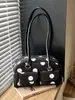 Bolso de axila de nicho estilo francés para mujer, nuevo bolso de lona de moda 2026 para el día a día, bolso de cubo con lunares para el hombro