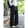 Calça de moletom esportiva oversized de outono com corte enviesado estilo americano, calça de perna larga com caimento fluido, calça casual para homens, modelagem solta e oversized