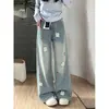 Chao Li tiene en stock jeans versátiles de pierna ancha rectos para mujer de tiro alto, corte holgado, adelgazantes, con diseño de bordado de lazo.