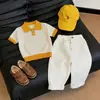 Ropa Infantil Estilo Coreano 2026 Verano Nuevo Elegante Bloques de Color Calado Tejido Transpirable Camisa Polo Pantalones Casuales de Pierna Recta