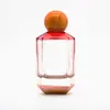 Luz de estoque Frasco de perfume 100ml em estoque fundo grosso frasco de perfume vazio frasco de perfume com spray colorido frasco de vidro com borda cortada