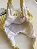 2023 Bolso de hombro tipo chaleco con diseño de nube, burbuja y flor estilo western, bolso de mano simple para estudiante, bolso tipo chaleco de burbuja para mujer