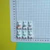 Coelho Fofo Sentado de Desenho Animado Usando Cachecol Resina DIY Capa de Celular Elástico de Cabelo Acessório de Cabelo Fivela de Sapato Material Acessórios Atacado