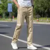Calças casuais versáteis masculinas folgadas retas elásticas calças de terno outono novo negócios slim fit trabalho calças de outono masculinas