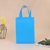 Bolsa de mano con recubrimiento de fabricante de origen en stock al por mayor en blanco para compras ropa bolsa no tejida plegable imprimible logo