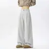 Pantalones rígidos texturizados para hombre para primavera y otoño, pantalones rectos versátiles de alta gama, para ir al trabajo y uso casual, pantalones largos holgados de pierna ancha con caída.