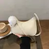 Bolsa feminina de axila estilo coreano 2026 nova tendência de primavera casual simples moda bolsa transversal com toque de qualidade bolsa de ombro versátil