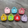 Monedero de silicona con forma de cueva cuadrada para niños, bolso cruzado para caminar, divertido y bonito bolso de silicona para cambio.