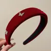 Elegante encantadora diadema vintage de terciopelo con pedrería 2022 Nueva celebridad de Internet accesorios para presionar el cabello femenino de otoño e invierno de alto sentido