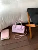 Bolsa de Mão de Moda Transfronteiriça para Mulheres 2026 Primavera/Verão Nova Versátil Tendência Bolsa Kelly Design Simples Bolsa Transversal