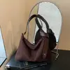 Bolsa Feminina Versátil Nova de Inverno 2026 Popular Fosca de Nicho para Axila Bolsa Transversal Bolsa de Ombro Único Tote Bag