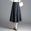 Falda de moda a cuadros para otoño e invierno, elegante falda de línea A de cintura alta para mujer, falda holgada y fluida de longitud media, nueva 2026