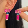 Pendientes de lápiz de aceite con forma de gota de color de contraste simple europeo y americano, pendientes femeninos creativos, frescos y divertidos, nuevos pendientes al por mayor