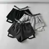 Estilo de chica calurosa de verano cintura elástica etiquetado cintura ajustada pierna ancha holgada pantalones cortos casuales calientes piernas largas pantalones cortos de cintura alta para mujer