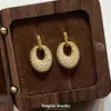 Pendientes Huecos Ovalados Chapados en Oro con Circonita Estilo Europeo y Americano para Mujer, Versátiles y de Alta Gama, Pendientes Huecos Más Vendidos Transfronterizos