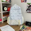 Nova mochila xadrez de nicho transfronteiriça, moda estilo coreano para meninas do ensino fundamental, mochila casual de alta estética