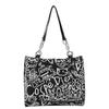 Bolsa de Lona Graffiti para Mujer 2025 Verano Nueva Bolsa de Hombro Casual de Gran Capacidad Bolsa Tote para Estudiantes para Clase y Desplazamientos