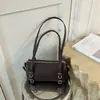 Bolso almohada de nicho moderno estilo coreano para mujer, nuevo modelo de verano 2026, bolso cuadrado pequeño simple con sensación de calidad, adecuado para el uso diario, bolso cruzado