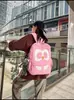 Mochila retro de gran capacidad para mujer, nuevo modelo 2026, diseño de bloques de color de nicho, tacto de alta gama, adecuada para viajes y como mochila escolar