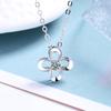 Collar de trébol de cuatro hojas de plata esterlina 925, versión coreana del diseño de nicho, sentido ins, cadena de clavícula, colgante de diamantes, fabricantes al por mayor para mujer