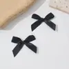 Venta al por mayor del fabricante Accesorios de moño de cinta de 1 cm DIY Semiacabado Pastel de cumpleaños Ropa interior Calcetines Moño hecho a mano