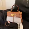 Diseño de Nicho Popular Transfronterizo Nuevo Bolso de Mano para Mujer Bolso Clásico Kelly Bolso de Hombro Cruzado de Moda