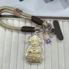 Barra de Ouro Puro 999 Concha d'Água com a Palavra "Fortuna" para o Deus da Riqueza, Chaveiro Atrator de Riqueza, Pingente de Corrente para Celular, Pingente de Bolsa Cartoon