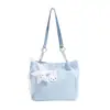 El popular bolso tote dulce de este año para mujer es el nuevo modelo de otoño 2026 con adornos de estrellas, adecuado para ir al trabajo y como bolso de hombro.