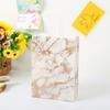 Versión coreana de la nueva bolsa de regalo de compras de moda para llevar a mano bolsa de papel Kraft bolsa tote creativa con patrón de mármol al por mayor