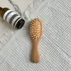 Pente de massagem de madeira de faia estilo mesmo de ponta pente com airbag pente de madeira placa grande pente com almofada de ar de silicone pente doméstico de madeira