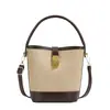 Bolso de mano de moda 2024 Invierno nuevo bolso tipo cubo retro bolso de hombro simple bolso cruzado simple de moda para mujer