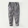 8236 verano nuevo lino puro transpirable pantalones de cordón para hombre color liso simples casuales pantalones para hombre una generación de pelo